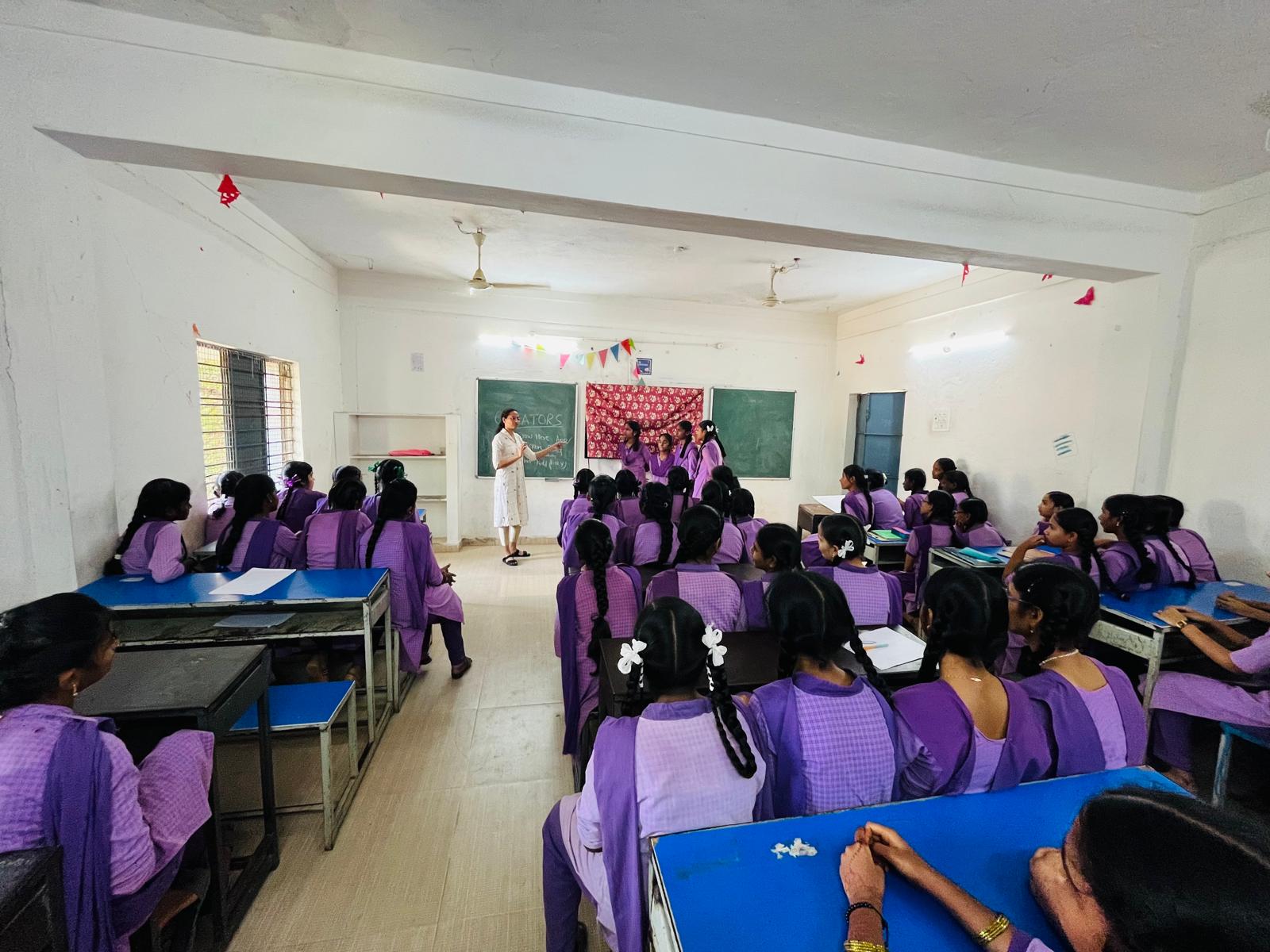 VTC program — students raising hands during a session