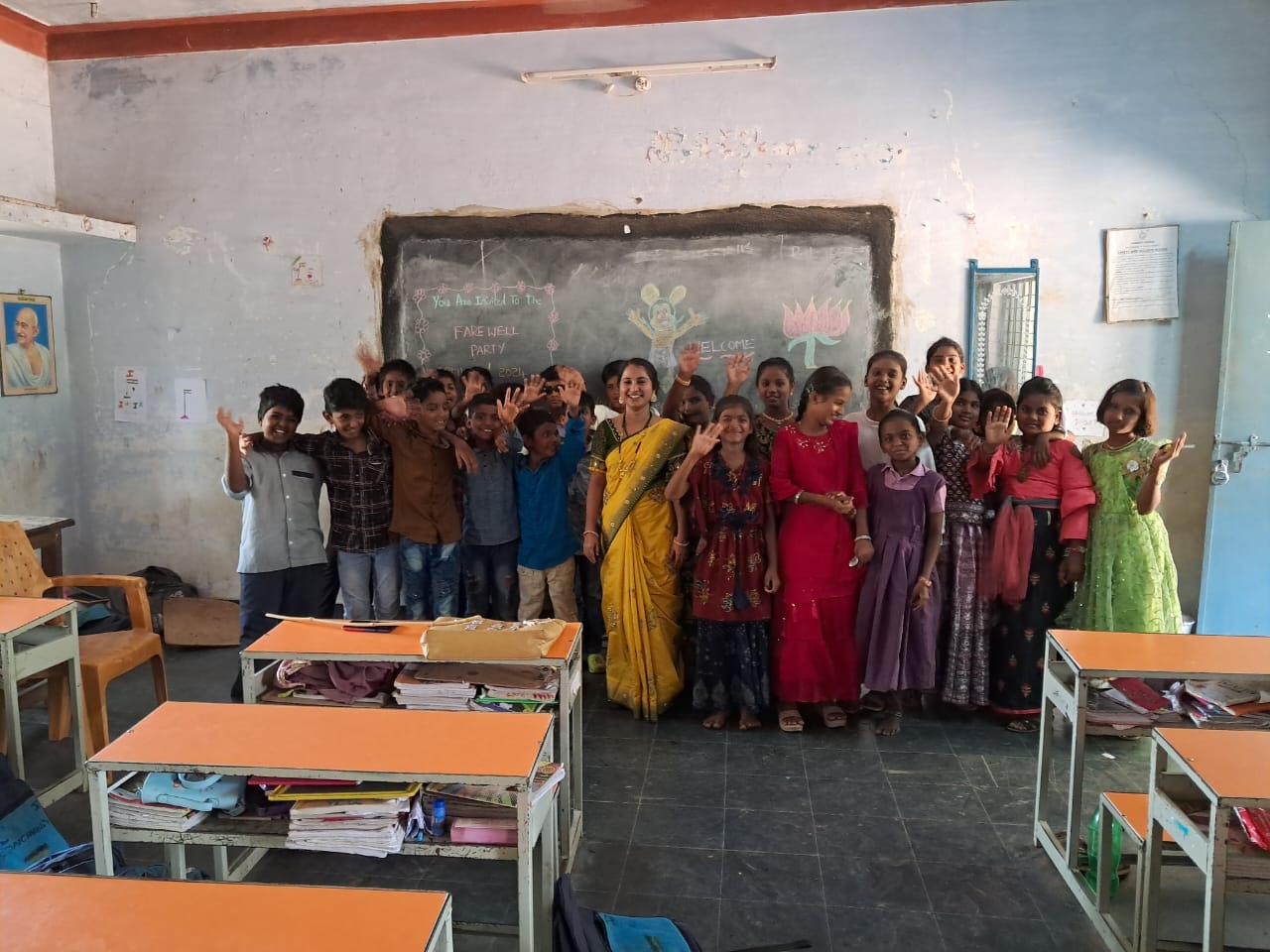 VTC students and teacher waving together